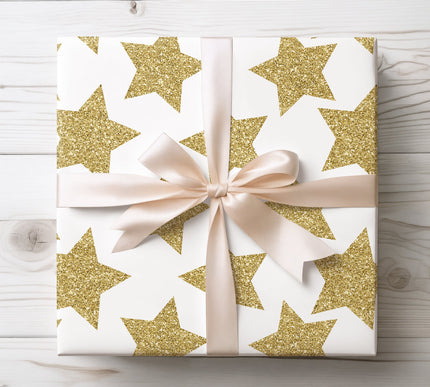 Elegant gold stars twinkling on a dark background, perfect for magical and festive holiday gifts. 