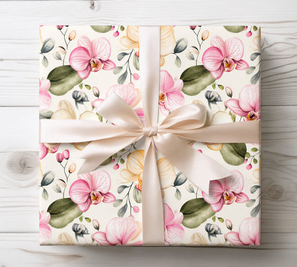 Delicate blush pink orchids in a graceful design, perfect for feminine and elegant gift wrapping. 