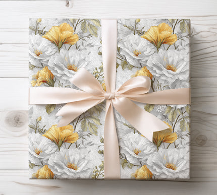 Vintage-inspired elegant floral pattern with white and yellow blooms, ideal for classic gift wrapping. 
