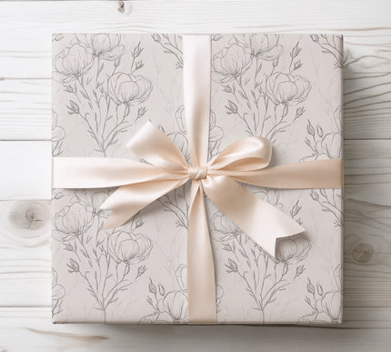 Delicate light pink poppies in a hand-sketched style, ideal for soft and feminine wrapping. 