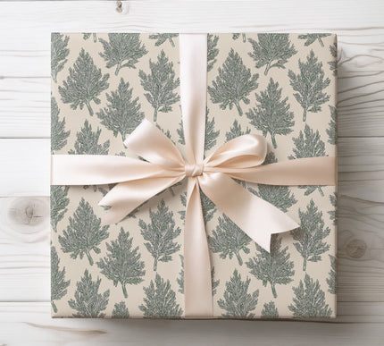 Subtle evergreen twig pattern capturing the spirit of nature and winter, perfect for seasonal gifts. 