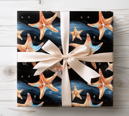 Artistic watercolor starfish set against a deep black ocean background, perfect for ocean-inspired gifts. 