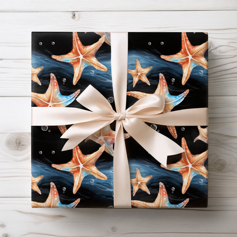 DeepTide – Watercolor Starfish on Black Ocean Wrapping Paper