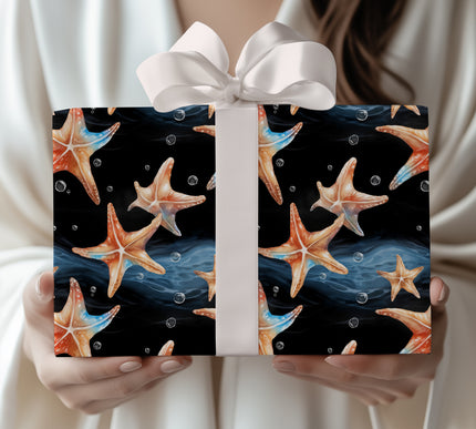 DeepTide – Watercolor Starfish on Black Ocean Wrapping Paper
