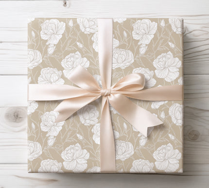 Wrap with sophistication using TaupeRose, a white rose floral wrapping paper on a taupe background. Perfect for weddings, anniversaries, and elegant occasions. A timeless design that adds grace to every gift. 