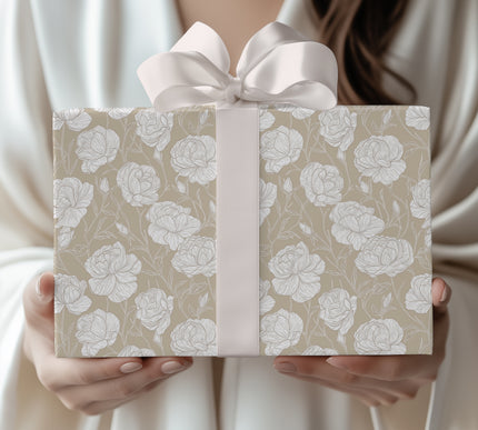 Wrap with sophistication using TaupeRose, a white rose floral wrapping paper on a taupe background. Perfect for weddings, anniversaries, and elegant occasions. A timeless design that adds grace to every gift. 