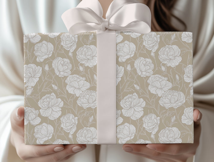Wrap with sophistication using TaupeRose, a white rose floral wrapping paper on a taupe background. Perfect for weddings, anniversaries, and elegant occasions. A timeless design that adds grace to every gift. 