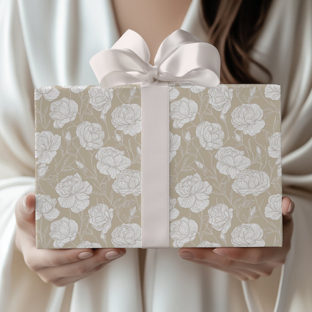 Wrap with sophistication using TaupeRose, a white rose floral wrapping paper on a taupe background. Perfect for weddings, anniversaries, and elegant occasions. A timeless design that adds grace to every gift. 