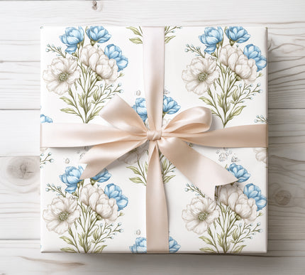 Soft white and blue flowers accented with crystal details, perfect for graceful and romantic wrapping. 