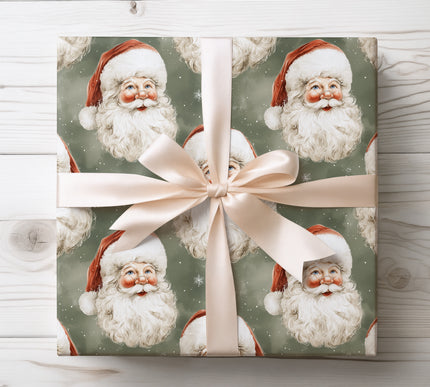 Holiday Green Gaze – Classic Santa heads with red hats on dark green snowy background wrapping paper