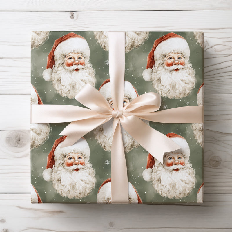 Holiday Green Gaze – Classic Santa heads with red hats on dark green snowy background wrapping paper