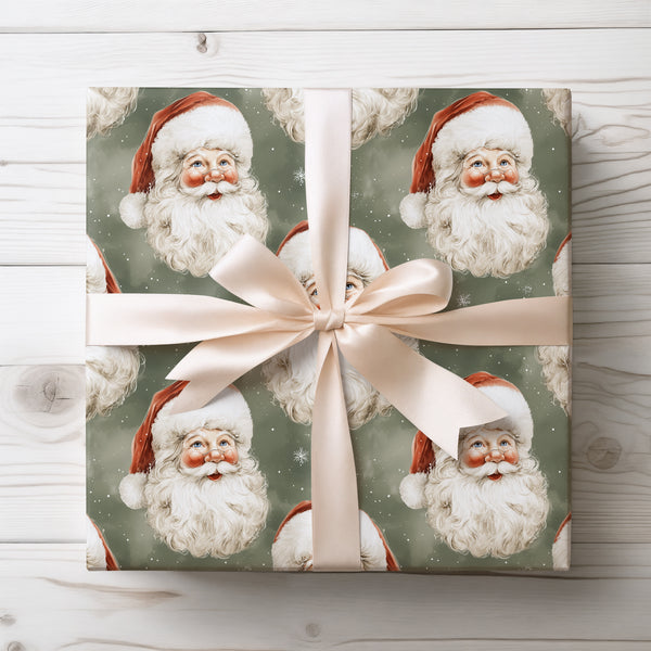 Jollygreen Gaze – Classic Santa heads with red hats on dark green snowy background wrapping paper