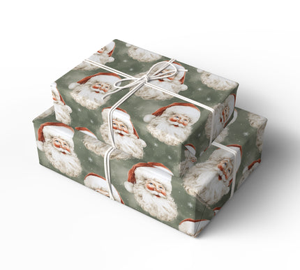 Holiday Green Gaze – Classic Santa heads with red hats on dark green snowy background wrapping paper