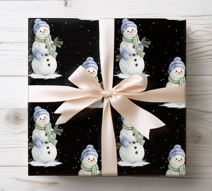 Friendly snowman wearing a blue hat, ideal for cheerful winter holiday gift wrapping. 
