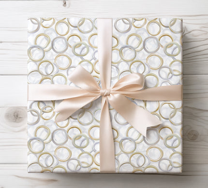 Elegant watercolor wedding rings in gold and silver on a clean white background, perfect for wedding gifts. 