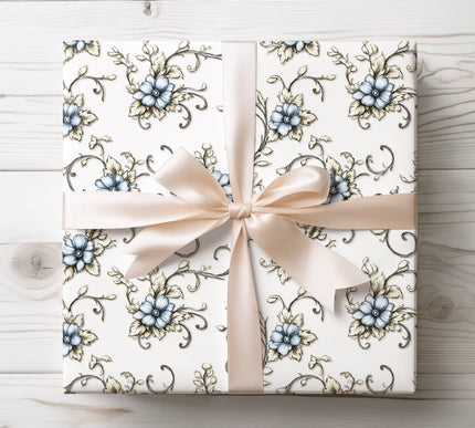 Vintage-style blue and beige floral scroll pattern on white, ideal for classic and refined gift presentations. 