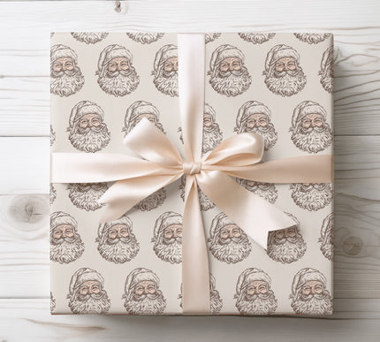 Celebrate the holiday season with JollySketch, a timeless vintage Santa Claus face wrapping paper. Perfect for traditional Christmas gift-giving, nostalgic celebrations, and holiday décor. This premium-quality wrap brings classic charm and festive cheer to every present under the tree. 