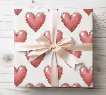Warm vintage red hearts in a stitched pattern, great for romantic or heartfelt gift wrapping. 