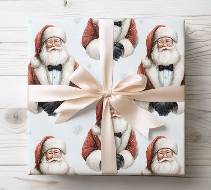 Elegant Santa dressed in a tuxedo surrounded by falling snowflakes, perfect for formal and festive Christmas wrapping. 