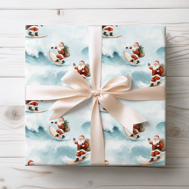 Arctic Tidings – Santa surfing with gift bag on winter ocean waves wrapping paper