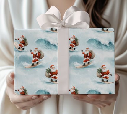 Arctic Tidings – Santa surfing with gift bag on winter ocean waves wrapping paper
