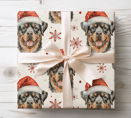 Festive Rottweiler design with red holiday hat and snowflakes, perfect for celebrating the season with pet lovers. 
