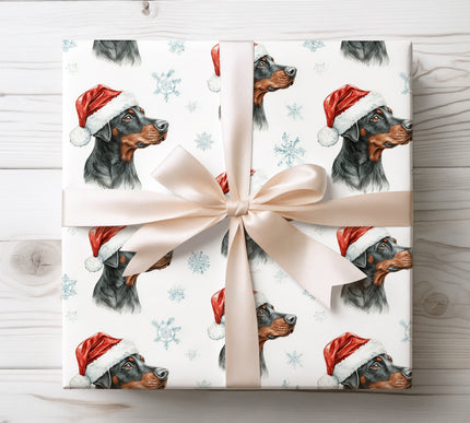 Elegant Dobermann design featuring festive Santa hat and snowflakes, ideal for Christmas gifts. 