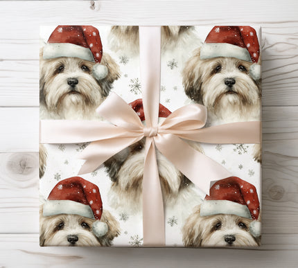 Adorable Shih Tzu in a Santa hat surrounded by snowflakes, perfect for festive gift wrapping. 