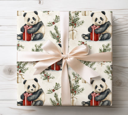 Heartwarming design of pandas hugging gifts among snowy pine branches, perfect for cozy holiday packaging.