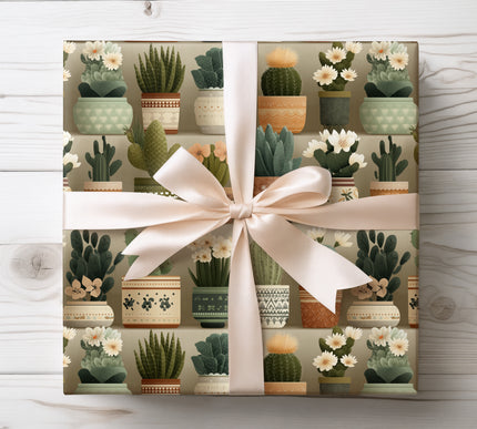 Wrap gifts with Thornweave paper featuring boho-style cactus planters and earthy tones. Perfect for trendy, nature-loving recipients.