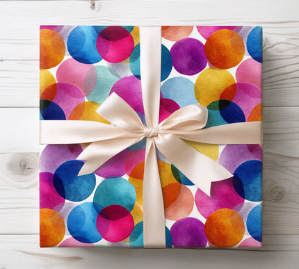 Celebrate with Confettica wrapping paper, decorated with colorful watercolor confetti circles. Perfect for birthdays and festive gifts.