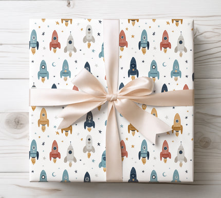 Ignite imagination with Starlit Launchpad wrapping paper showcasing colorful rockets for kids. Ideal for birthdays and space enthusiasts.