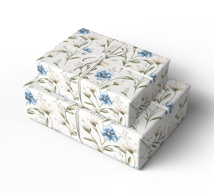 Petalwhisper Dusk – Elegant floral design with blue and cream blossoms on ivory wrapping paper
