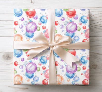 Add a pop of color with Bubble Bloom wrapping paper featuring translucent bubbles in vibrant hues. Great for birthdays and joyful gifts.
