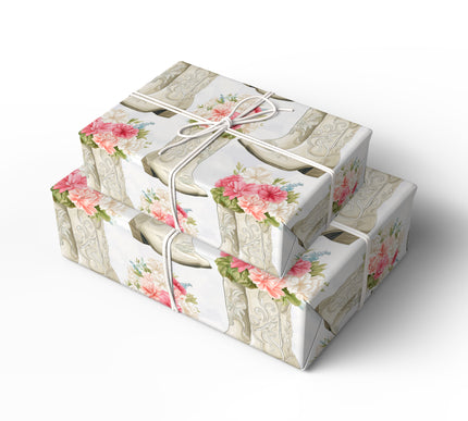 Roserune Westspur – White cowboy boots filled with pink and white flowers wrapping paper