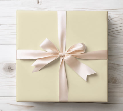 Elevate your gift-giving with Silken Whisper, a luxurious cream wrapping paper. Its neutral elegance makes it perfect for weddings, anniversaries, and timeless celebrations. A refined choice for any special occasion. 