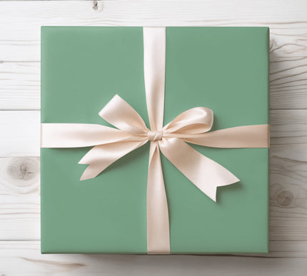 Add a refreshing touch with Emerald Haze, a solid mint green wrapping paper. Ideal for weddings, baby showers, spring events, and birthdays. A versatile pastel wrap that’s both elegant and modern. 