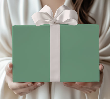 Add a refreshing touch with Emerald Haze, a solid mint green wrapping paper. Ideal for weddings, baby showers, spring events, and birthdays. A versatile pastel wrap that’s both elegant and modern. 