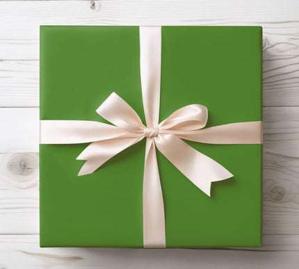 Wrap with elegance using Emerald Veil, a rich solid green wrapping paper. Perfect for Christmas gifts, weddings, birthdays, and sophisticated occasions. Premium finish ensures a refined, timeless presentation. 