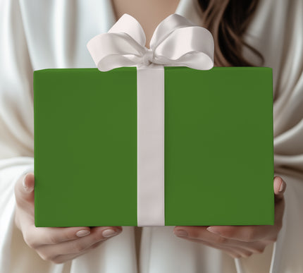 Wrap with elegance using Emerald Veil, a rich solid green wrapping paper. Perfect for Christmas gifts, weddings, birthdays, and sophisticated occasions. Premium finish ensures a refined, timeless presentation. 