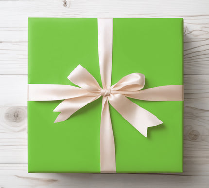 Celebrate with nature’s vibrance using Meadowlight, a solid bright green wrapping paper. Perfect for spring birthdays, eco-inspired events, or festive holidays. A bold, versatile gift wrap available in glossy or matte finishes. 