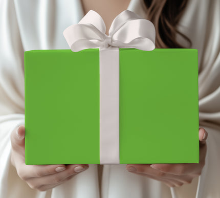 Celebrate with nature’s vibrance using Meadowlight, a solid bright green wrapping paper. Perfect for spring birthdays, eco-inspired events, or festive holidays. A bold, versatile gift wrap available in glossy or matte finishes. 