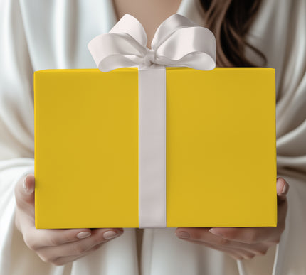Shine bright with Golden Solara, a solid yellow wrapping paper that adds a burst of joy to birthdays, summer celebrations, and festive events. Premium-quality finish available in multiple sizes, making it versatile for any gift occasion. 