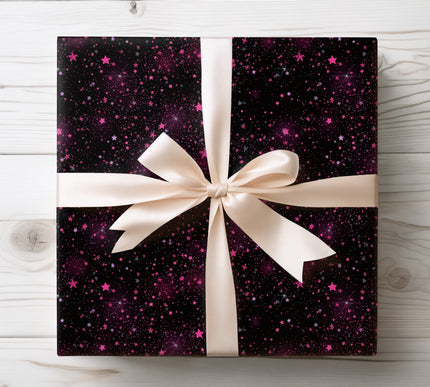 Add a fun cosmic touch with StarBlush wrapping paper, decorated with pink stars on a black galaxy background. Great for birthdays, parties, and space-themed gifts. Premium paper with vibrant color contrast.