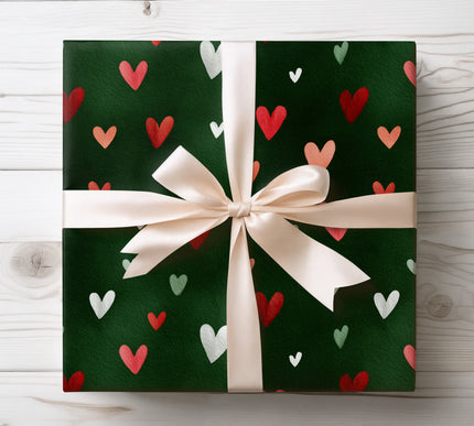 Celebrate love and warmth with Heartmere wrapping paper, decorated with red and white hearts on a green watercolor background. Perfect for romantic gifts, holidays, and special occasions. Soft texture and high-quality print.
