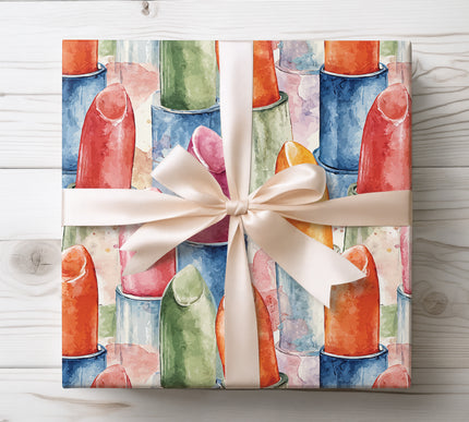 Perfect for makeup fans and fashionistas, Kiss of Radiance wrapping paper showcases stylish lipstick patterns in vibrant colors. Use it to add a glamorous touch to birthday gifts, holidays, or beauty product packaging. High-quality, glossy finish.