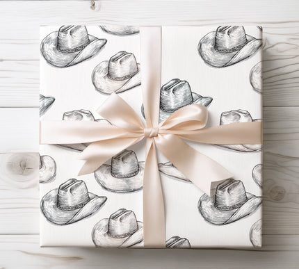 Celebrate the spirit of the Wild West with RodeoShade wrapping paper, showcasing vintage cowboy hat sketches in rustic tones. Perfect for rodeo lovers, country-themed parties, and western-style gifts. Durable, stylish, and unique.