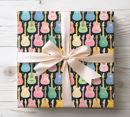 Wrap your gifts in style with this vibrant Melodic Strings wrapping paper featuring colorful guitar patterns. Perfect for music enthusiasts, guitar players, and anyone who loves creative, artistic designs. Ideal for birthdays, holidays, and special occasi