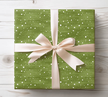 Capture holiday charm with EverSprig, a green snow-themed wrapping paper ideal for festive gift wrapping and seasonal décor. 