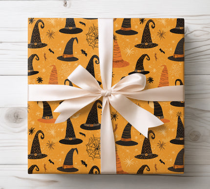 Celebrate Halloween with HexenHats, a festive wrapping paper featuring whimsical witch hats. Perfect for spooky gift-giving, party favors, and seasonal décor. 